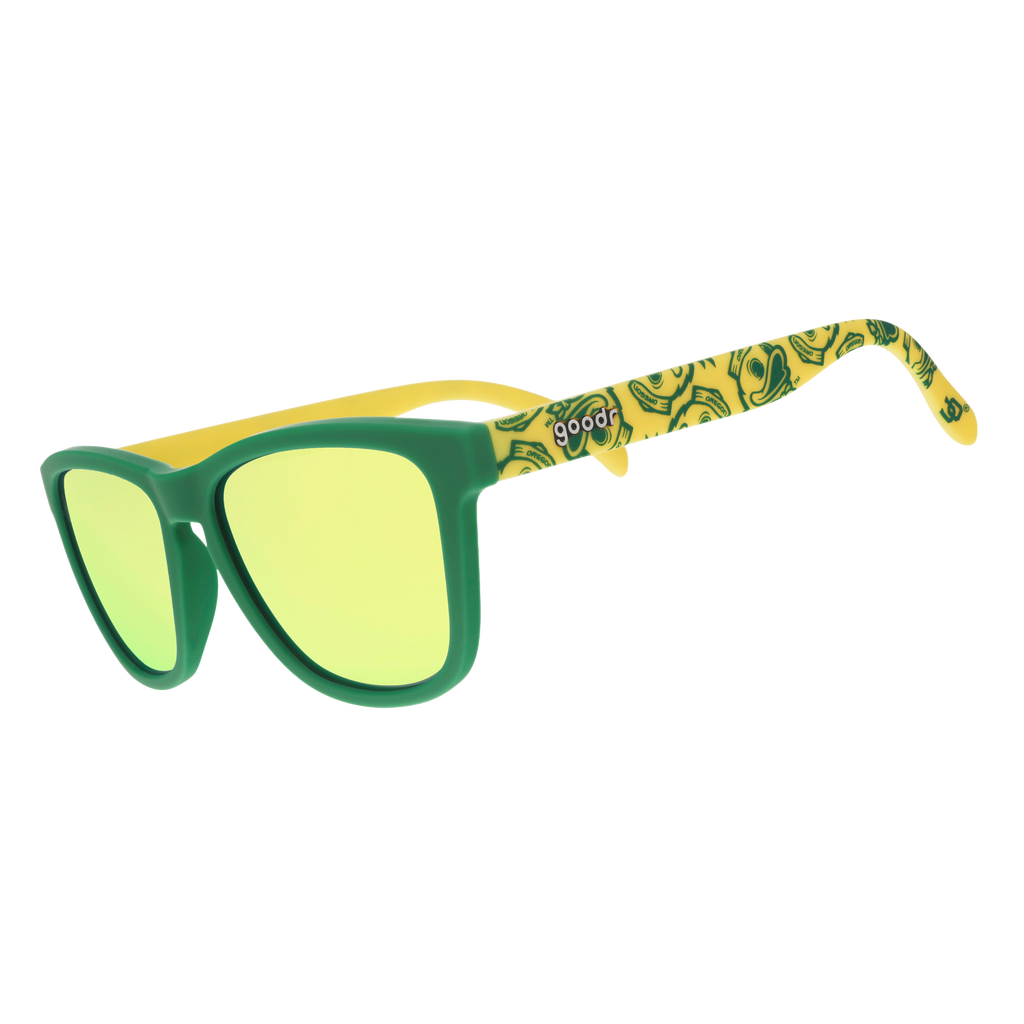 Three quarter angle of yellow-and-green sunglasses featuring the Oregon Ducks duck mascot and gold-green reflective lenses. 